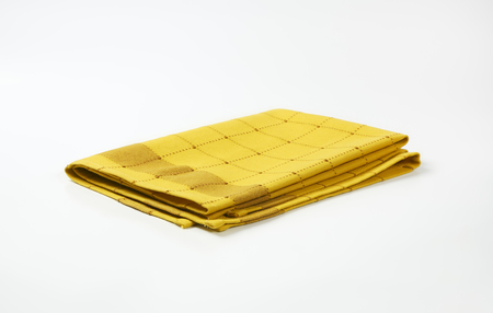 yellow and brown checkered dish towelの写真素材