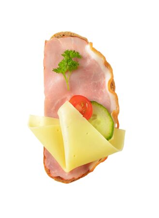 slice of bread with ham and cheeseの写真素材