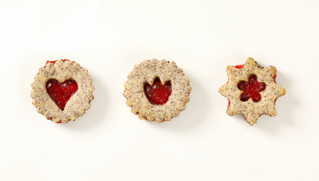 shortbread cookies with jam filling on white backgroundの写真素材
