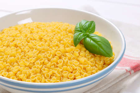 bowl of small pasta shells - close upの写真素材