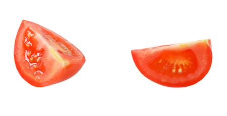 two tomato quarters on white backgroundの写真素材