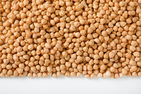 raw chickpeas on white backgroundの写真素材