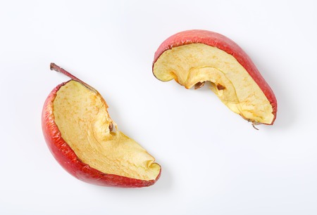 dried apple wedges on white backgroundの写真素材