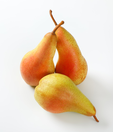 three ripe pears on white backgroundの写真素材