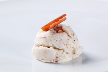 Scoop of stracciatella ice cream topped with chocolate shavingの写真素材