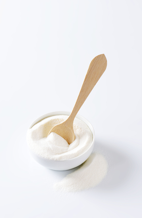 Bowl of full cream powdered milkの写真素材