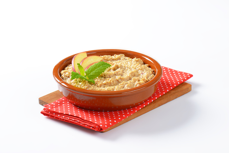 Bowl of white oats porridgeの写真素材