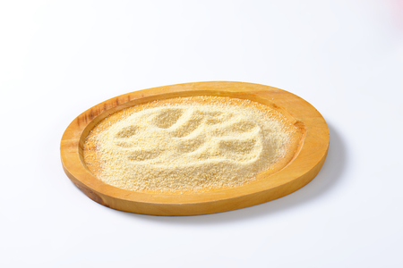 Pile of breadcrumbs on cutting boardの写真素材
