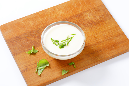 Bowl of creamy salad dressing with onion flavorの写真素材