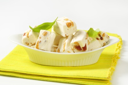 Soft nougat with peanuts and fruitの写真素材