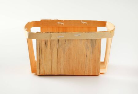 Empty rectangular wooden basket for berry fruitsの写真素材