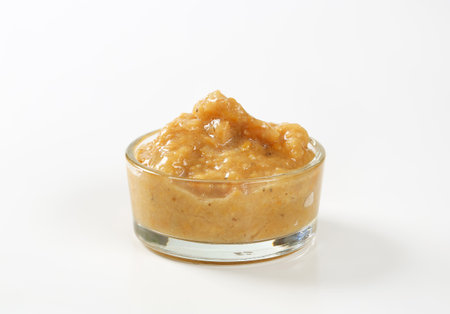 Eggplant (aubergine) dipping sauce or spread in small glass dishの写真素材