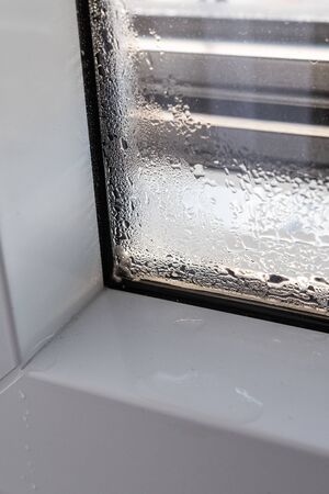 Bad window condition in house - water on glass