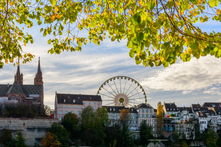 Cityscape of Basel, Switzerland with a ferris wheel.
