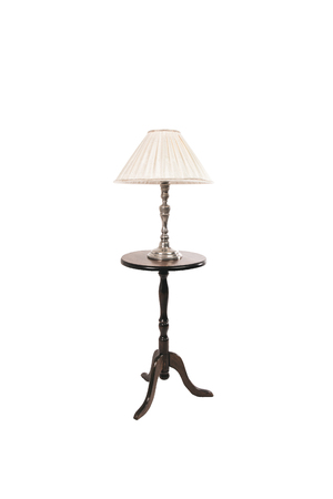 Old metal lamp on a old lamp tableの写真素材