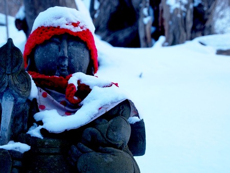 Statue in the snow, Hokkaido, Japanの写真素材
