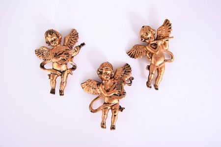 Three angelic cherubs on whiteの写真素材