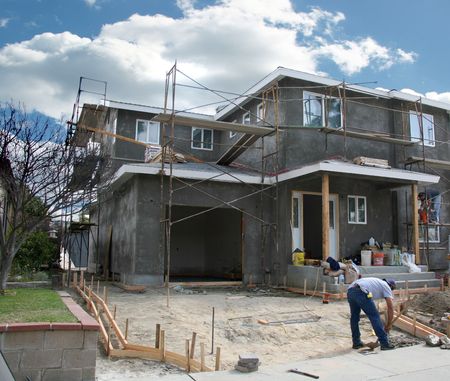 Residential Home Under Construction With Workers on the Job