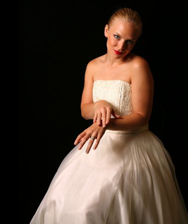 Beautiful Bride Against Dramatic Black Backgroundの写真素材