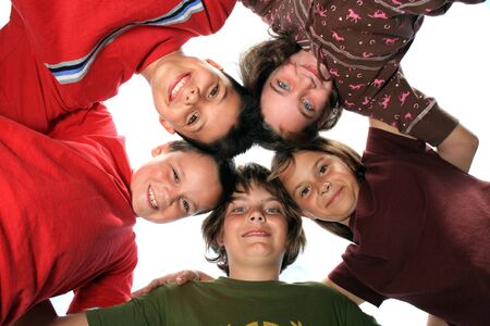 Young Kids Huddled Togetherの写真素材