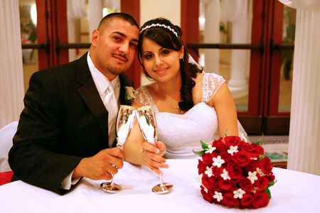 Bride and Groom Toasting To Their New Life Together Image Shot in High ISOの写真素材