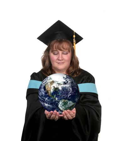 Female Graduate Holding the World in Her Handsの写真素材