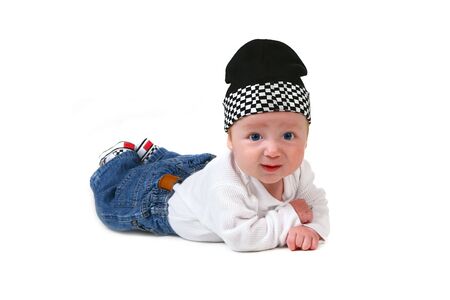 Adorable Infant Lying on His Tummy Smilingの写真素材