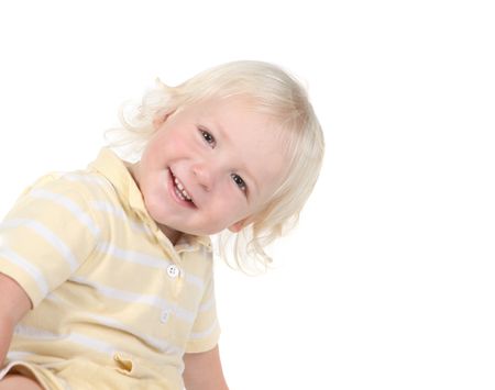 Happy Smiling Toddler Looking While Leaning Overの写真素材