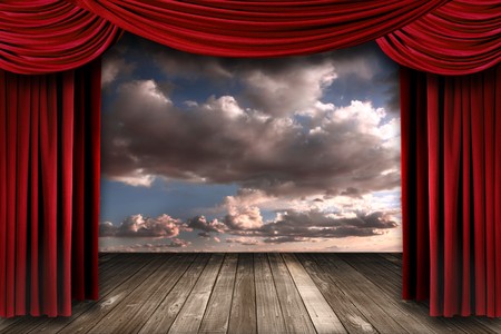Beautiful Stage With Red Velvet Theater Curtains and Dramatic Sky Backgroundの写真素材