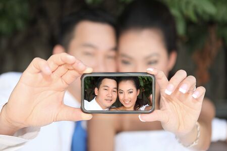Beautiful Portraits of a Bride and Groom Couple on Their Wedding Dayの写真素材