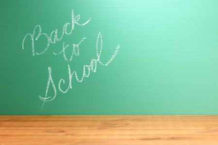 Teacher Chalkboard with Handwriting Back to School with Copy Spaceの写真素材