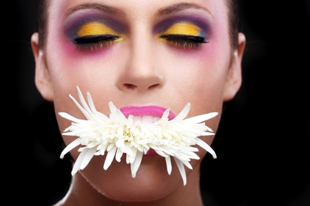 Beautiful Woman With Extreme Spattered Make Up on the Faceの写真素材
