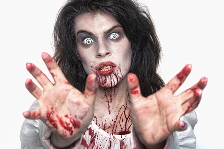 Bleeding Psychotic Woman in a Horror Themed Imageの写真素材