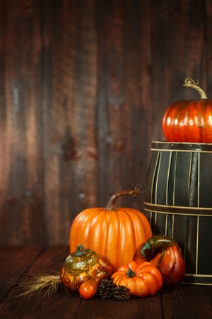 Rustic Fall Themed Scene With Pumpkins on Wood Grunge の写真素材