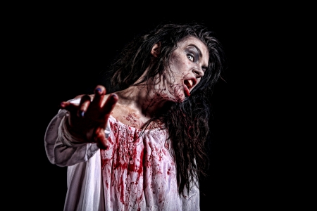 Bleeding Psychotic Woman in a Horror Themed Imageの写真素材