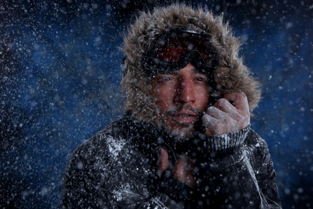 Dramatic Image of Scruffy Man Freezing in Cold Weatherの写真素材