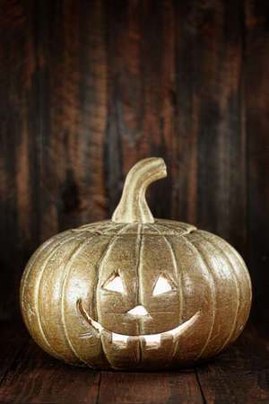 Pumpkin Jack O Lantern on Wood Grunge Rustick の写真素材