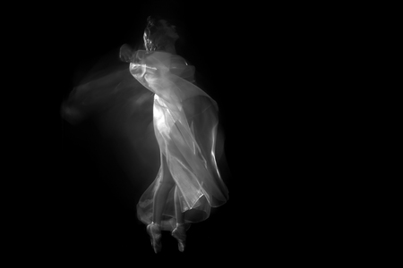 Artistic Image of Movement With Sheer Fabric and Long Exposureの写真素材