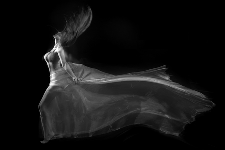 Artistic Image of Movement With Sheer Fabric and Long Exposureの写真素材