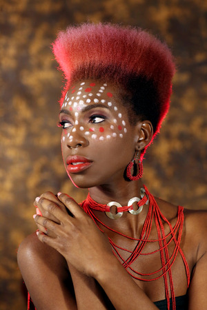 Beautiful Expressive African American Woman With Dramatic Lightingの写真素材