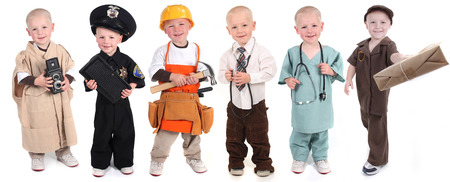 Six Occupation Versions Represented by a Child Police Construction Doctor Mail and Photographerの写真素材