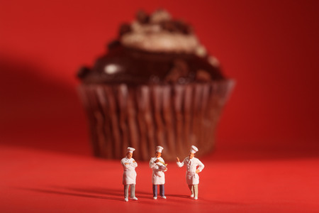 Funny Rendition of Miniature Chefs With Cupcakeの写真素材