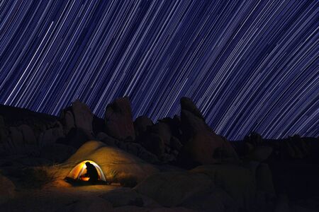 Tent Camping at Night in Joshua Tree Parkの写真素材