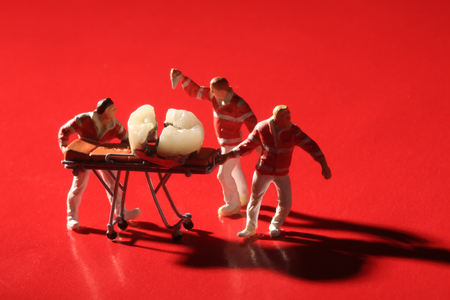 Hilarious Miniature Workers Performing Dental Procedures. Dental Office Art.の写真素材