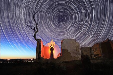 Girl Light Painted in the Desert Under the Night Skyの写真素材