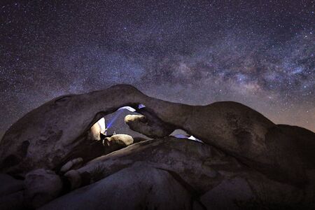 Girl Light Painted in the Desert Under the Night Skyの写真素材