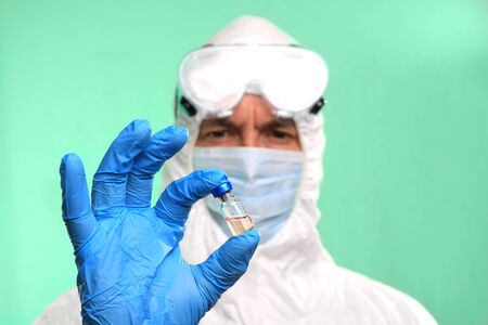 Male Lab Technician Working to Fight Global Pandemicの写真素材