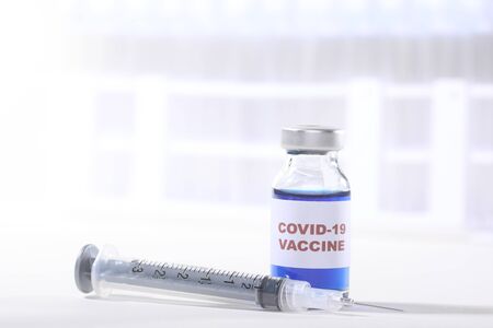 Covid-19 Virus Vaccine Shot in Vial Ready to Administerの写真素材