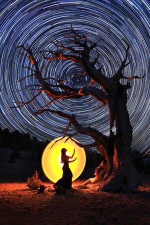 Person Light Painted in the Eastern Sierras Under the Night Skyの写真素材