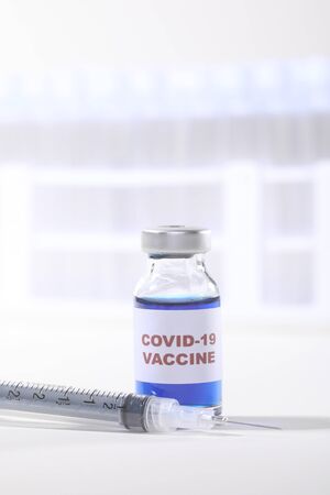 Covid-19 Virus Vaccine Shot in Vial Ready to Administerの写真素材